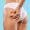 Skin Elasticity Check Concept. Closeup cropped view of unrecognizable young woman pinching her buttocks, examining cellulite, wearing white panties isolated on blue studio background